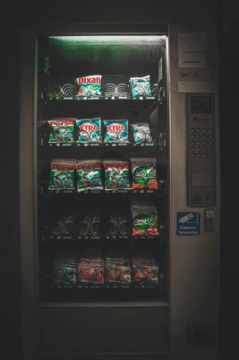 the vending machine is filled with food items