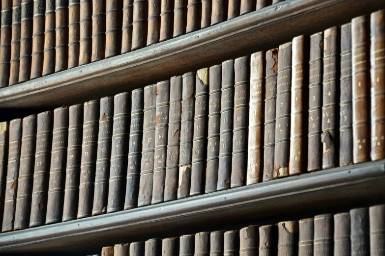 books stacked up on top of each other