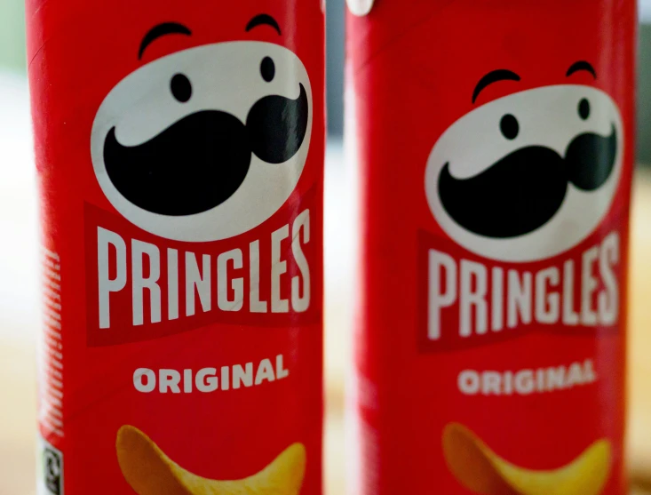 two canned pringles sit next to each other