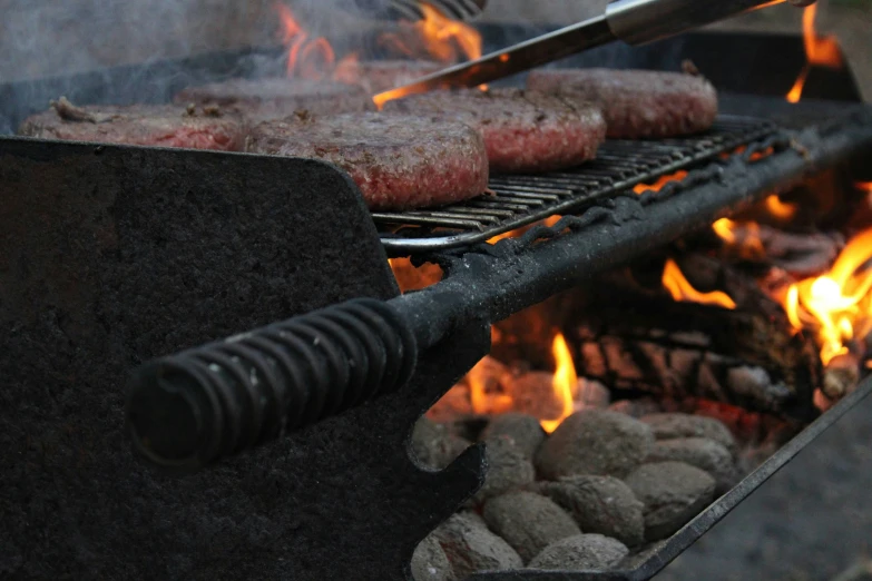 some food is cooking on top of a grill