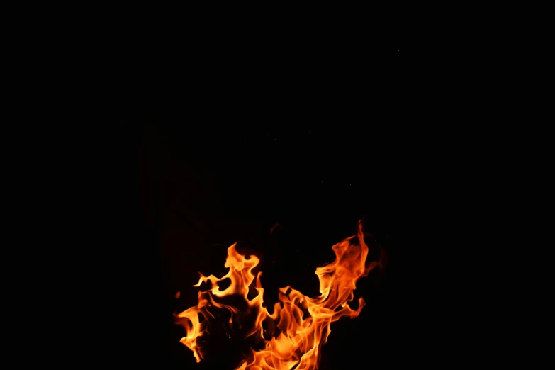 the image shows flames as if in a dark environment