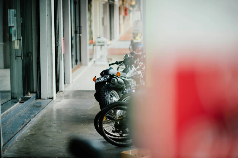 a row of motorcycles parked in front of buildings