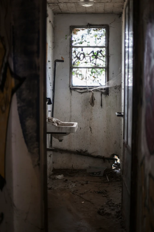 a bathroom is seen through the door