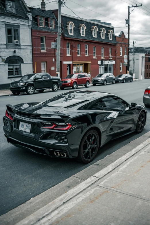 two cars parked on the side of the street