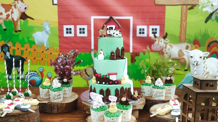 small cake with farm animals sitting on the table