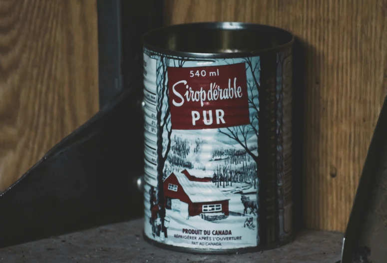 a tin can with the label for the sampenskiut pur on it