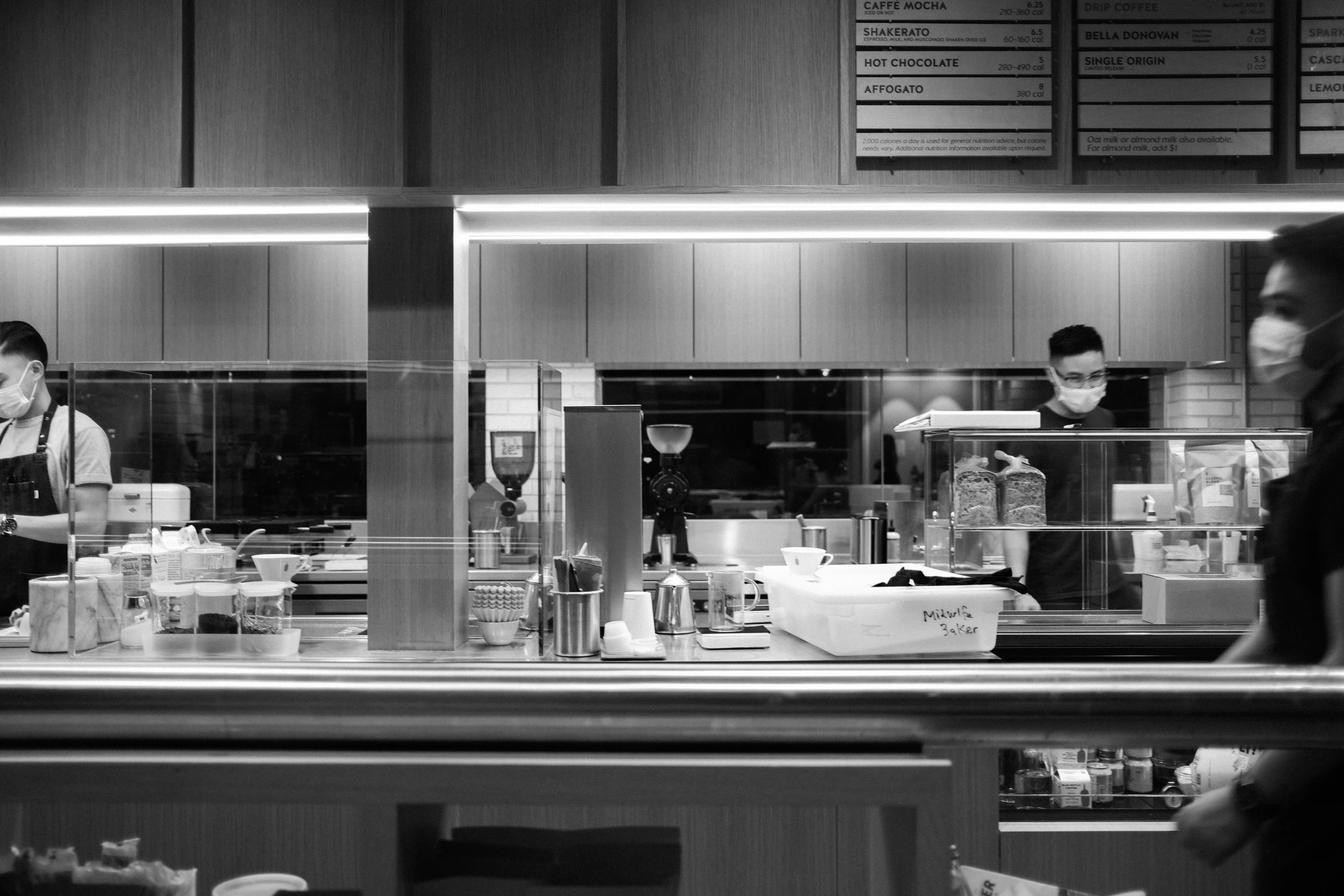 two women working at counter in a restaurant