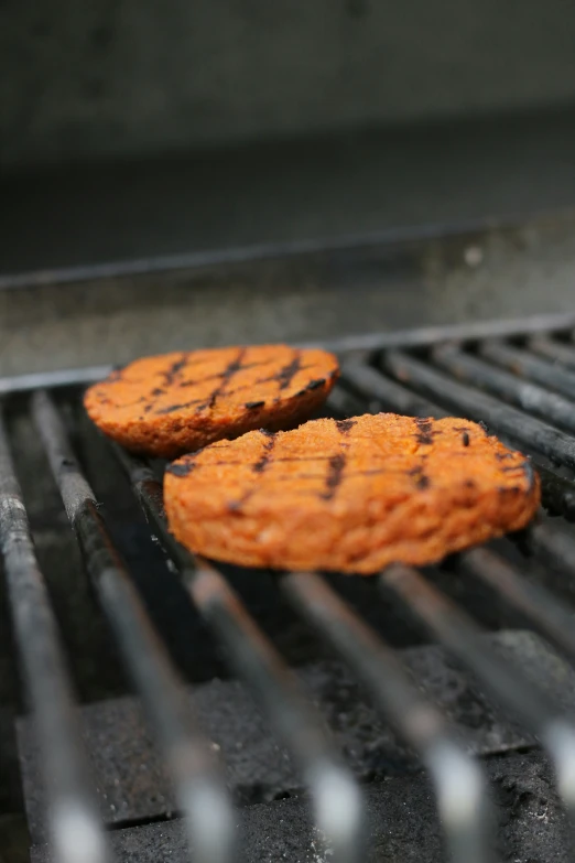 hamburgers cooking on the grill for some tasty to enjoy