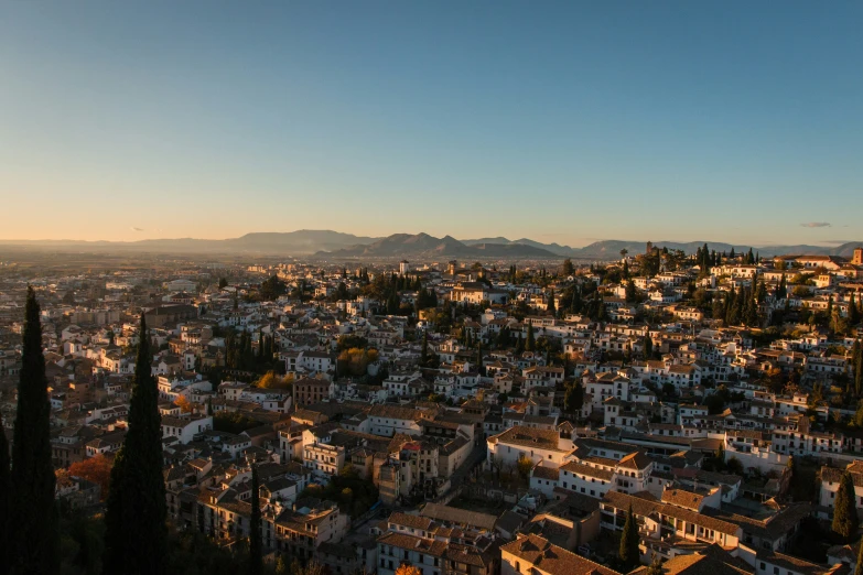 a view of the city from above of the mountains