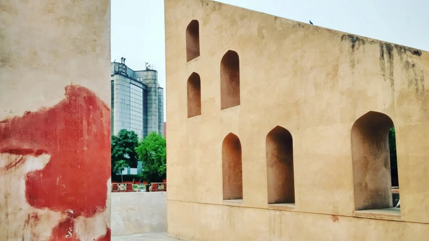 some very tall brick structures with some holes in them