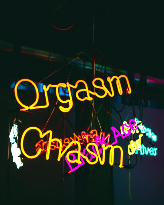 neon light signs with different languages in the dark