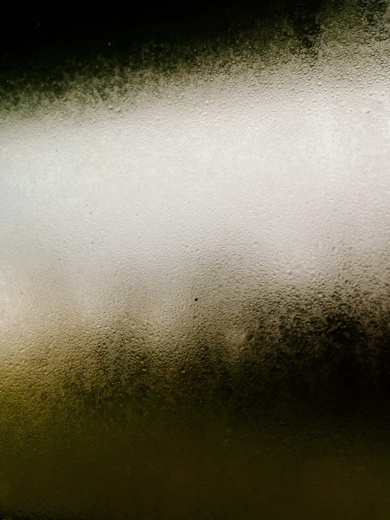 an image of rain in front of a black background