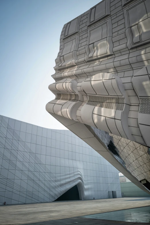 the architecture of a building with wavy shapes