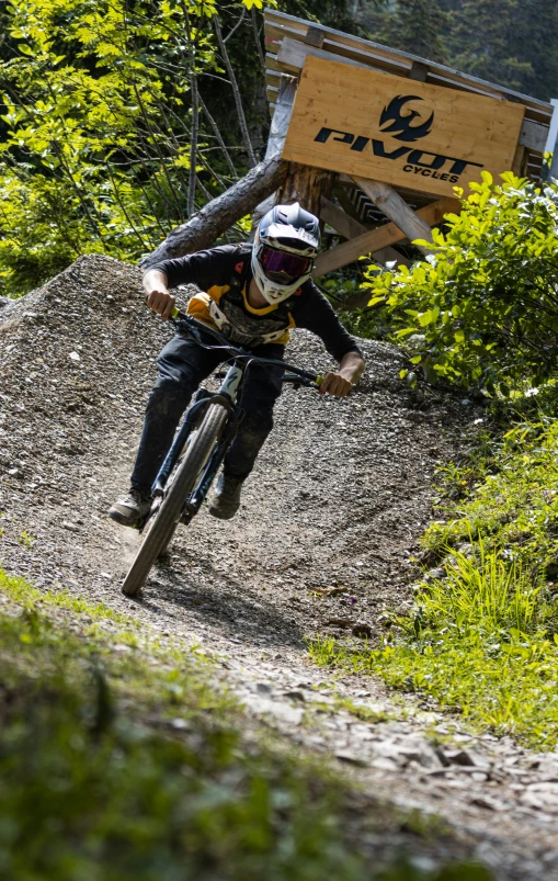 a mountain biker is riding on a trail