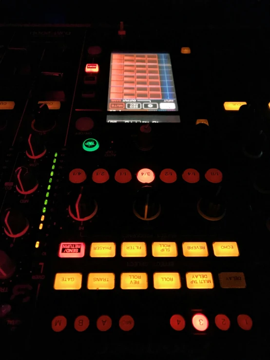 a close up s of the electronic mixing board