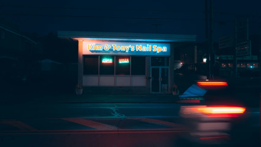 neon lights on the corner of a store front