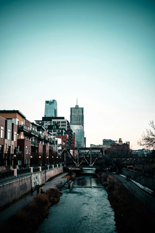 the view of buildings and a river at night