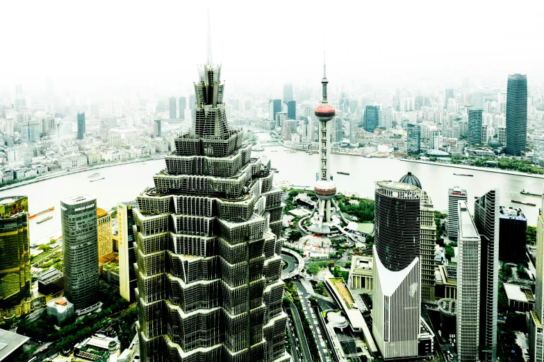 a large city skyline with a boat on the river