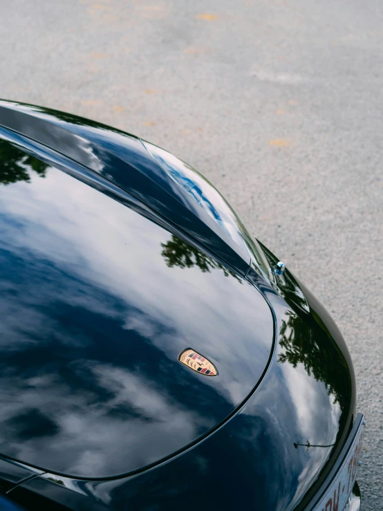 a car with the top view of it showing its chrome paint