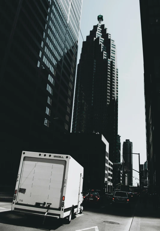 an image of a city setting with a white truck