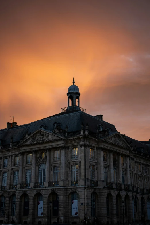 a po of the sky over an old building