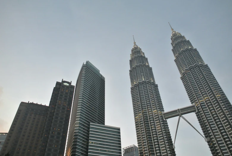 a line of tall buildings against a blue sky