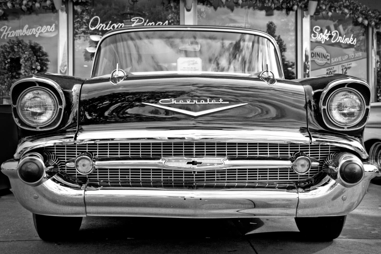 a close up view of the front end of an antique car