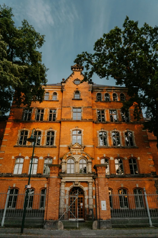 a red brick building sitting on the corner of a street