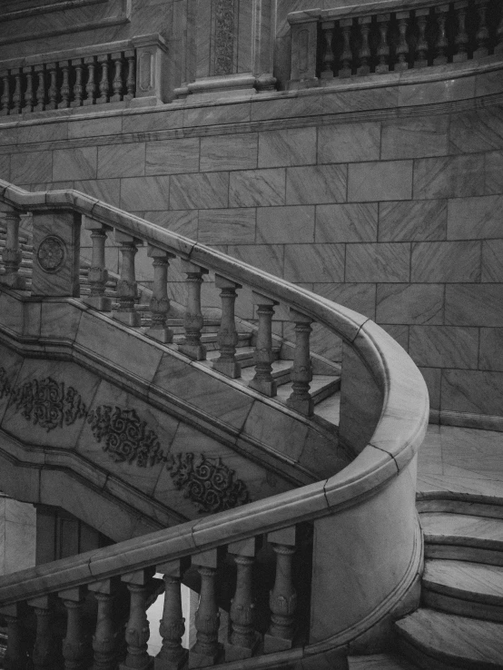 a person with a skateboard going down a stair case