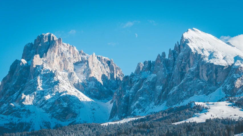 a mountain side covered in lots of snow