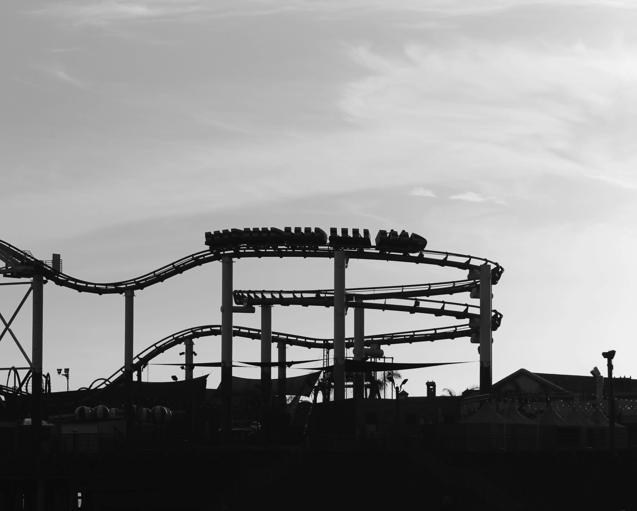 an amut park with a water roller coaster