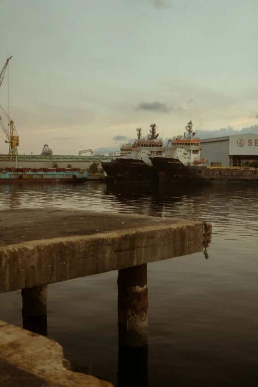 two ships in the water on either side of the dock