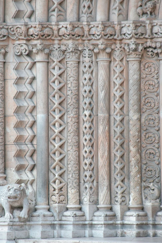 a close up of a very decorative building with large columns