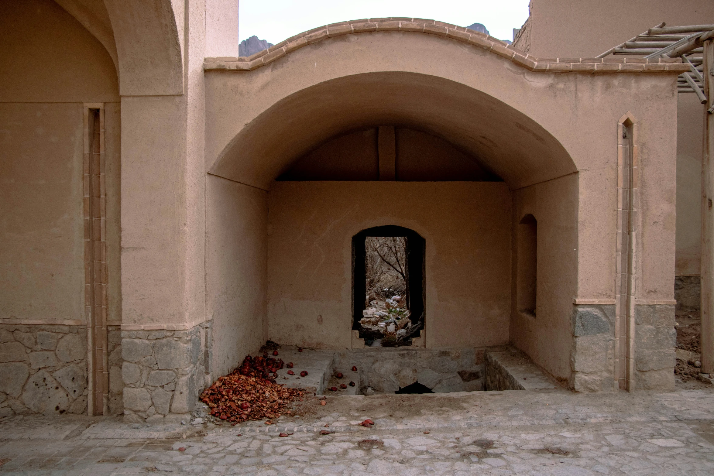 the interior of a building with only a small window