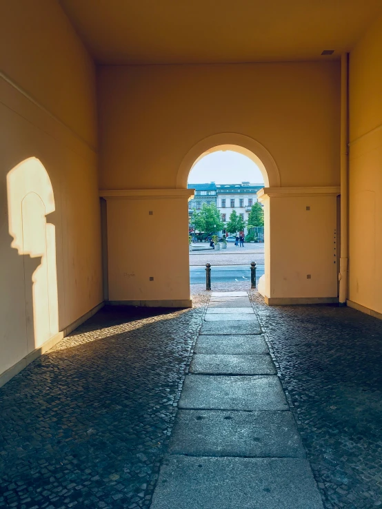 an open hallway that leads to a building