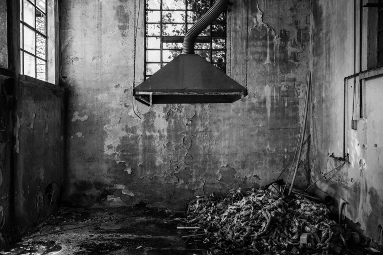 the inside of a rundown room, showing a lot of rust