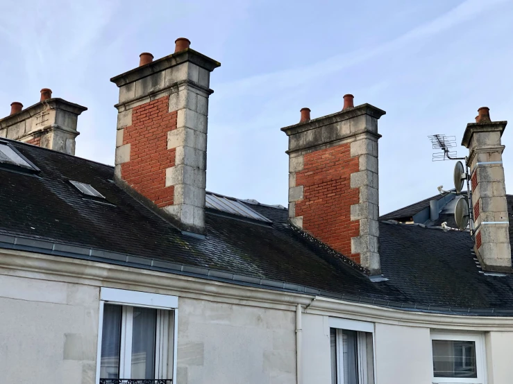 the chimneys and chimneys are visible from the roofs of buildings