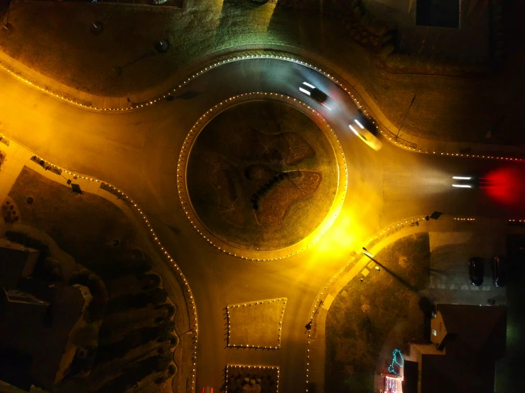 an overhead s of city streets at night