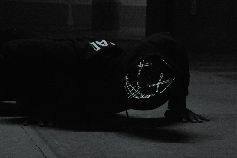 a person on a skateboard performing a handstand