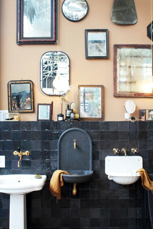 this black and white bathroom has several different fixtures on the wall