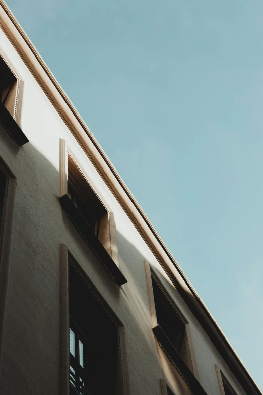 the top of a building that has windows