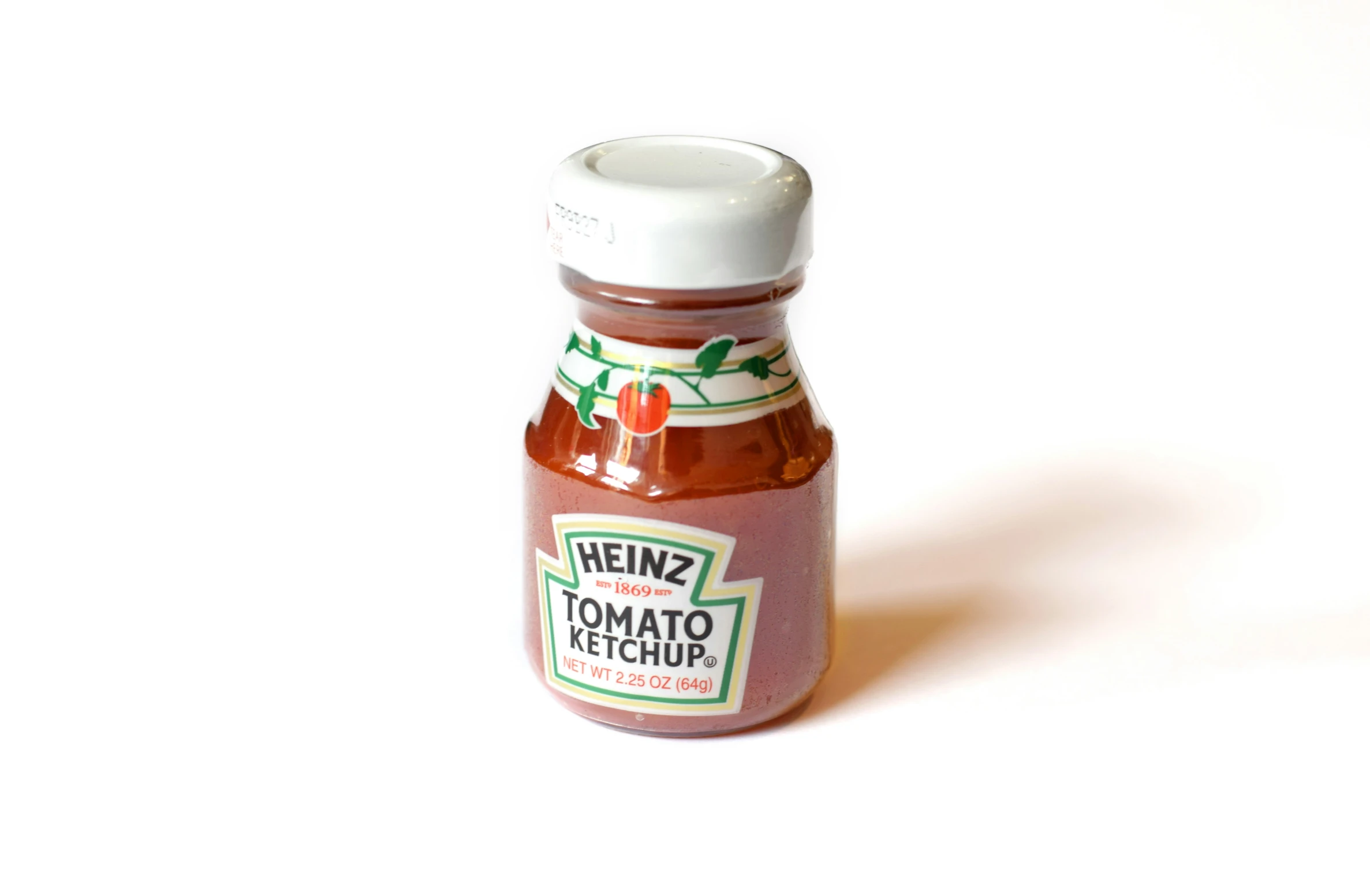 a bottle of heinz tomato dressing sits on the table