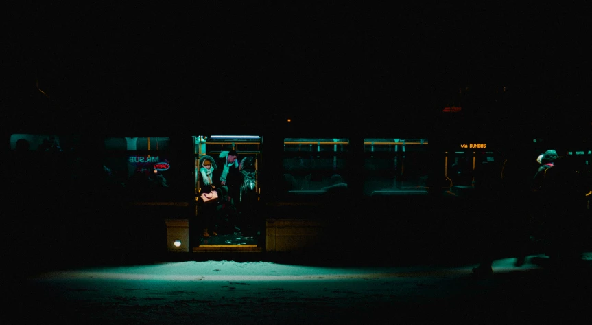 night scene with a bus on the street at night
