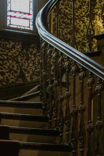 this staircase has an elaborate design on the side