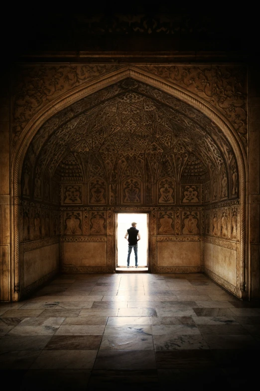 a person is standing outside of an entrance door