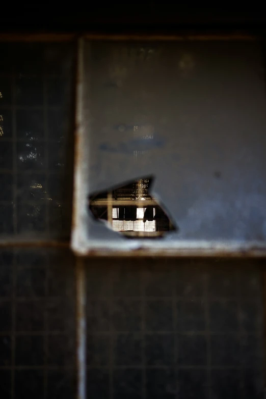 the roof of a building is seen through a mirror