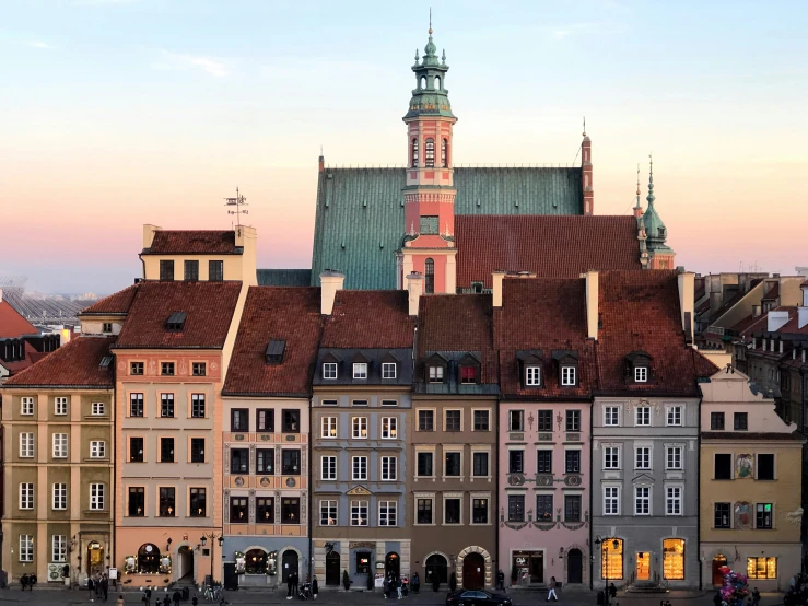 several buildings are shown near a clock tower