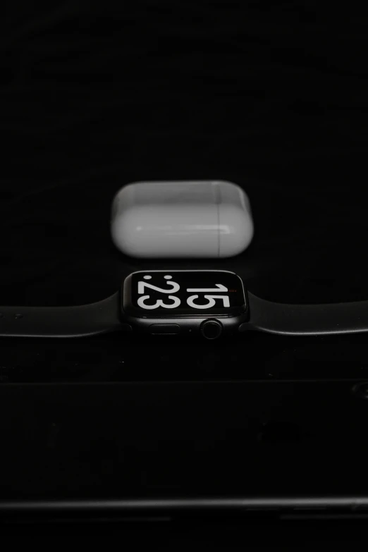 a black and white po with an electronic pill in it