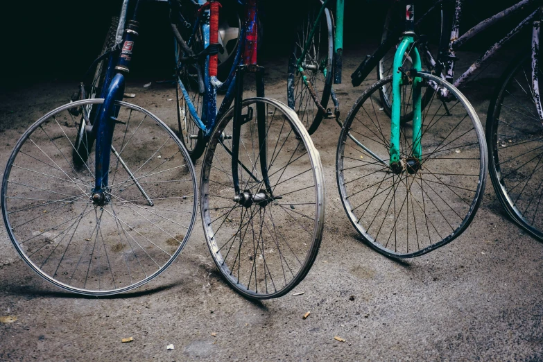 a group of bicycles standing next to each other