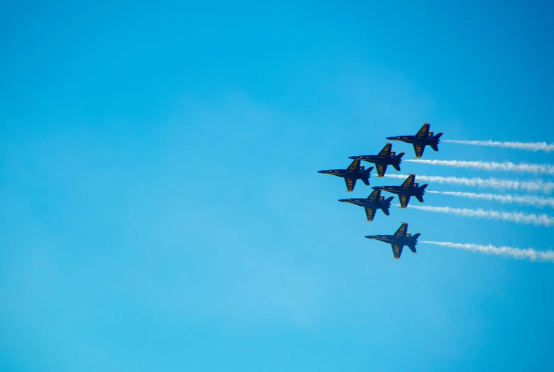 six jets that are flying through the sky